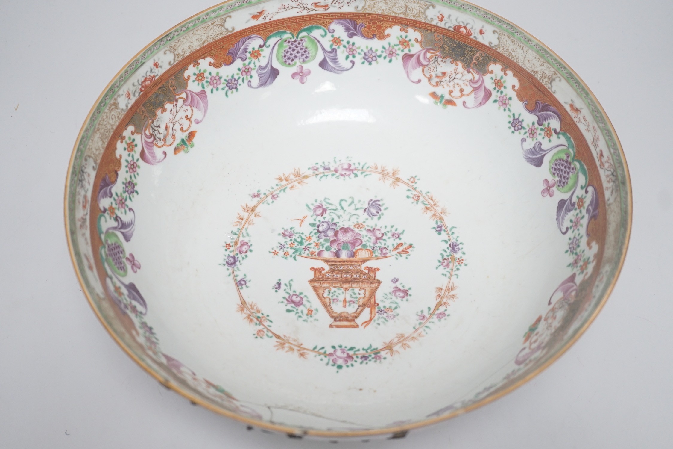 An 18th century Chinese export famille rose ‘mandarin’ punch bowl, 31cm diameter (af)